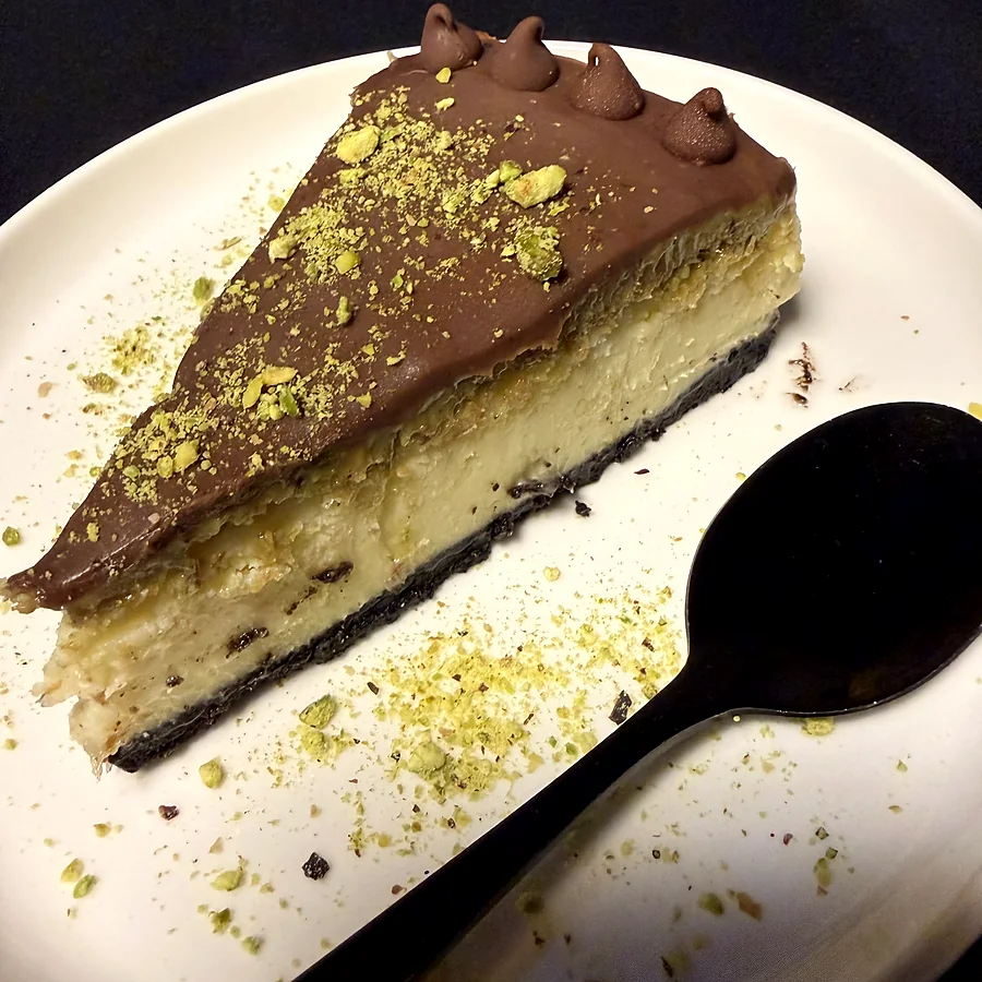Slice of chocolate pistachio cheesecake