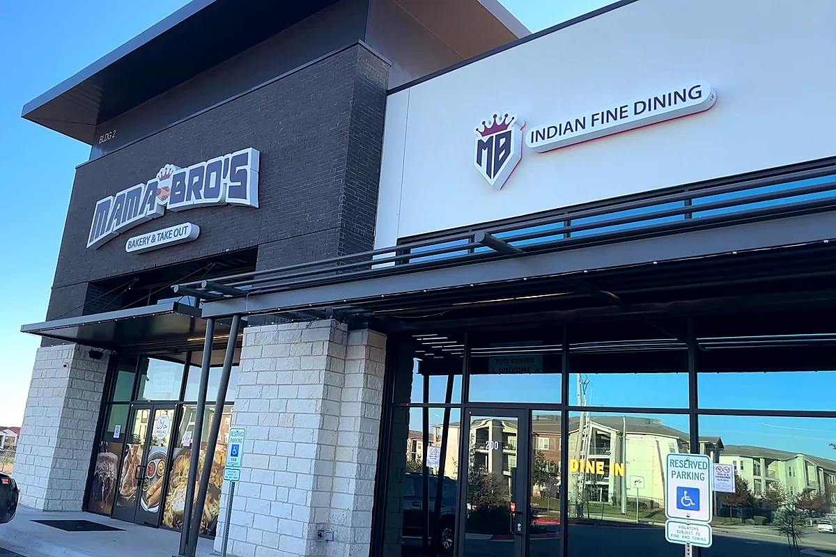Mama Bro's building on Wells Branch Parkway in Pflugerville with Indian Fine Dining sign